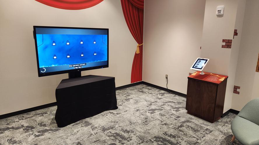 Technology provided for the Juggler of Our Lady exhibit at the University of Dayton Roesch Library. This included a television with a looping slideshow and an iPad with an interactive slideshow.